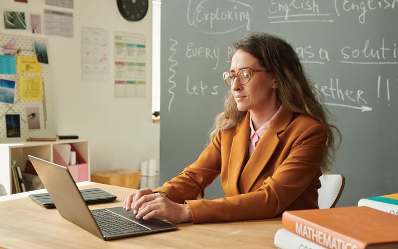 Speech therapist conducting a speech and language evaluation with a school-age child
